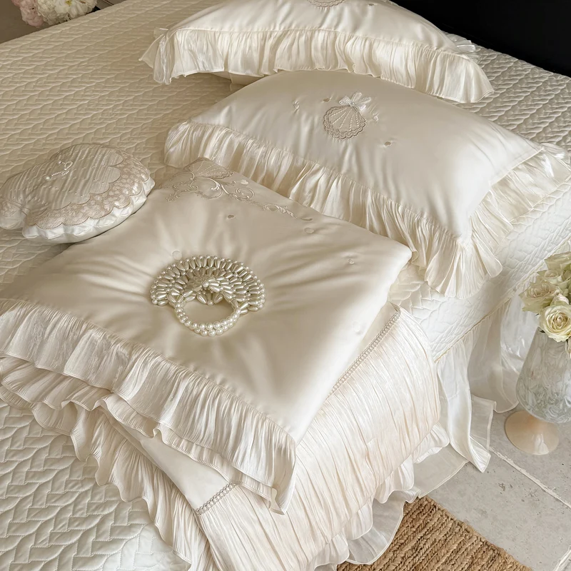 Elegant embroidered satin bedding set with frill pillow and quilted bedspread Stornfield