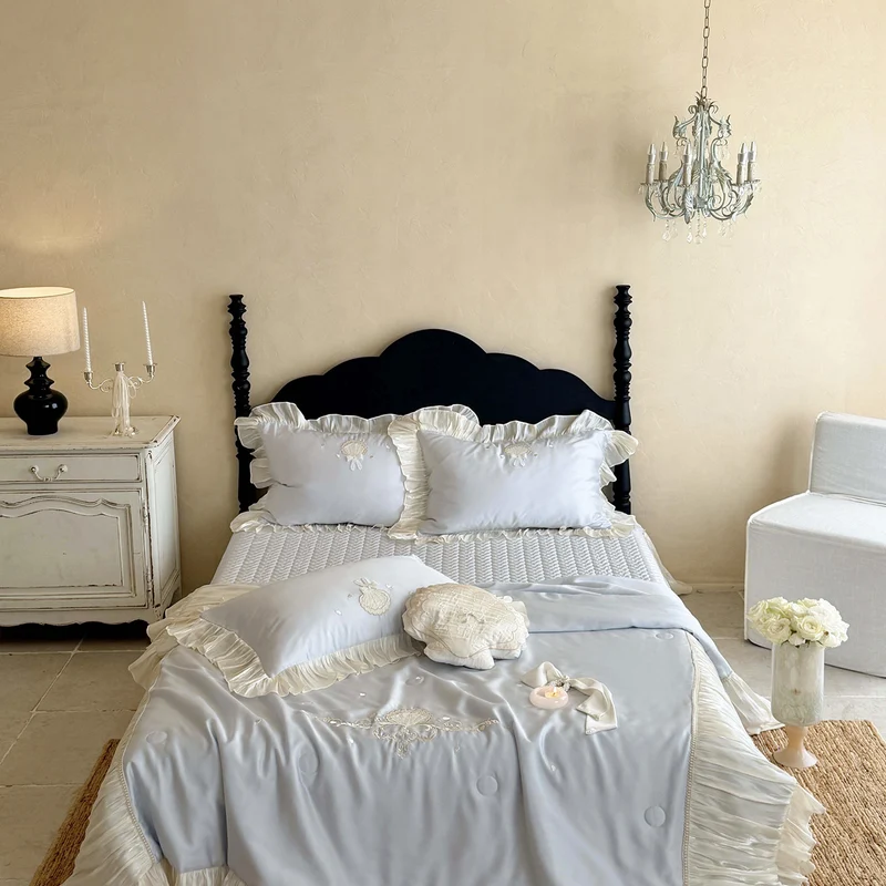 Elegant embroidered satin bedding set with frill pillow and quilted bedspread Stornfield