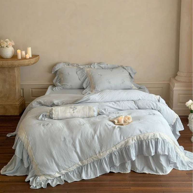Bedding set with romantic ruffle trim and rose embroidery Stornfield
