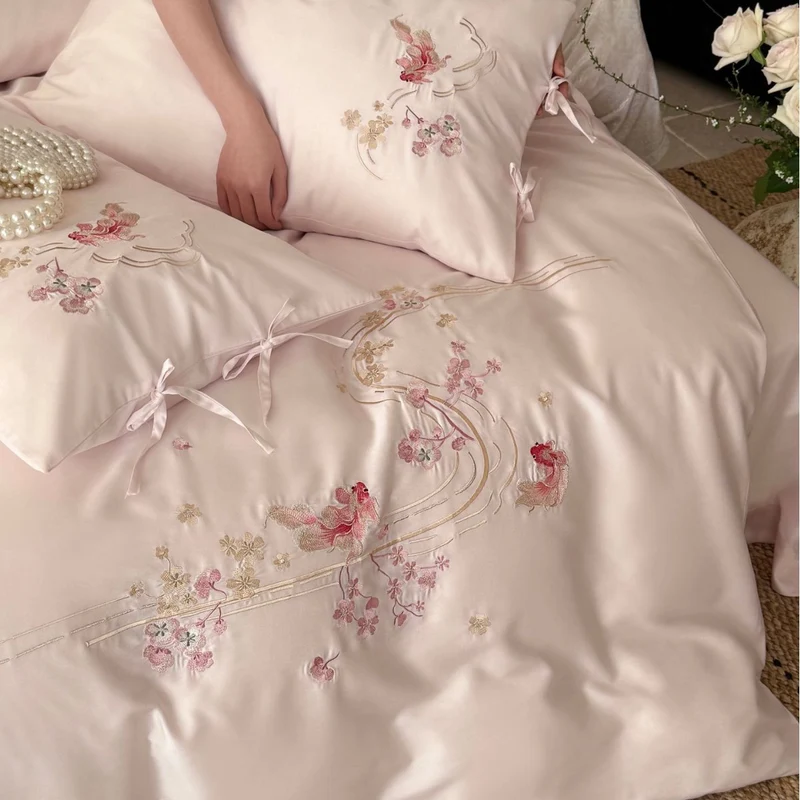 Embroidered satin bedding set with ribbon ties and delicate floral embroidery Stornfield