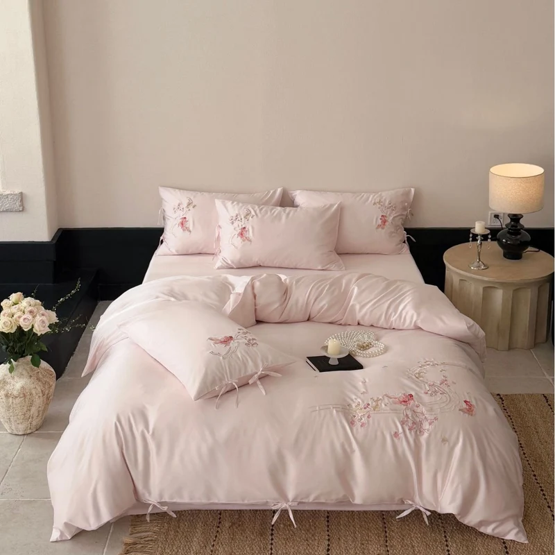 Embroidered satin bedding set with ribbon ties and delicate floral embroidery Stornfield