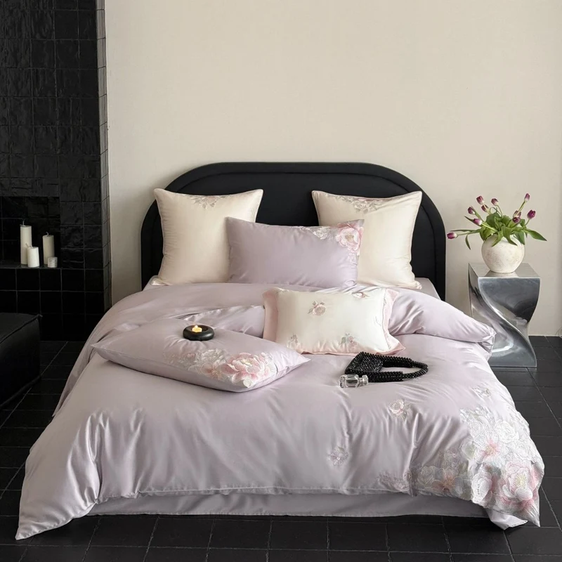 Embroidered satin bedding set with floral relief embroidery and silky finish Stornfield