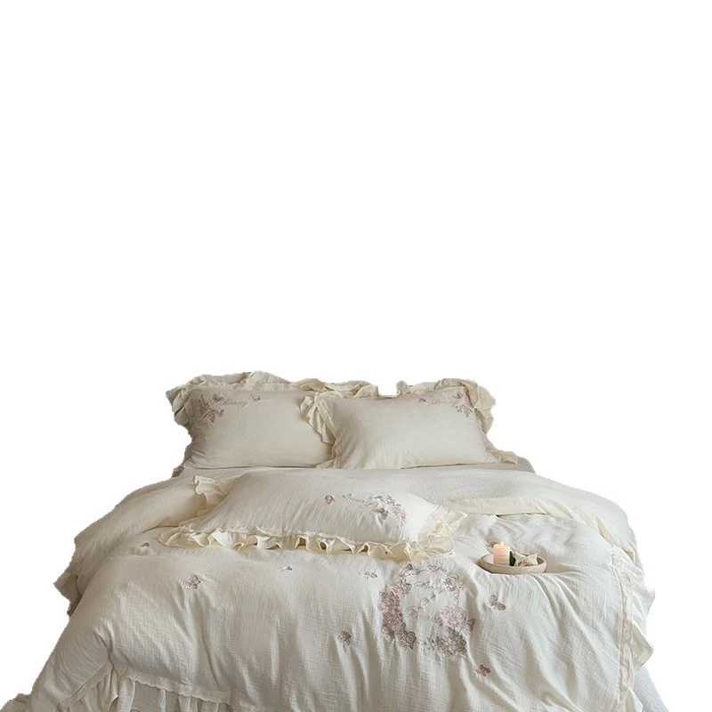 Embroidered cotton muslin bedding set with ruffle and floral watercolor embroidery design Stornfield