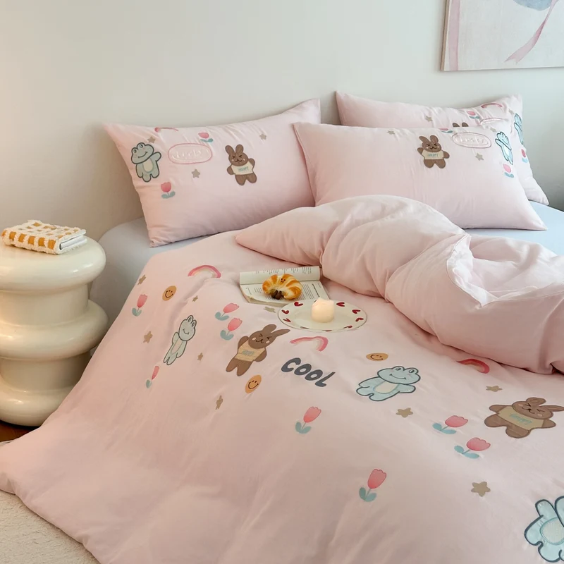 Cotton bedding set with embroidered donut motif and pillowcases Stornfield